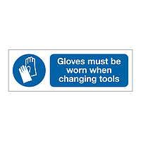 Gloves must be worn when changing tools sign